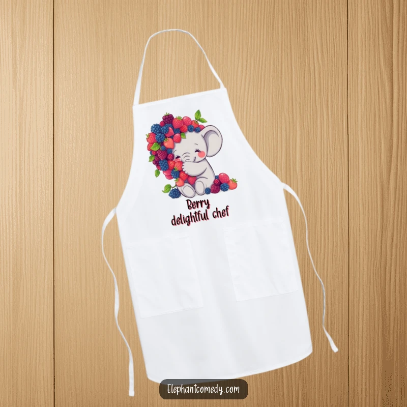 Funny elephant apron featuring a sweet grey elephant character embracing a large pile of colorful berries, a fun kitchen accessory.