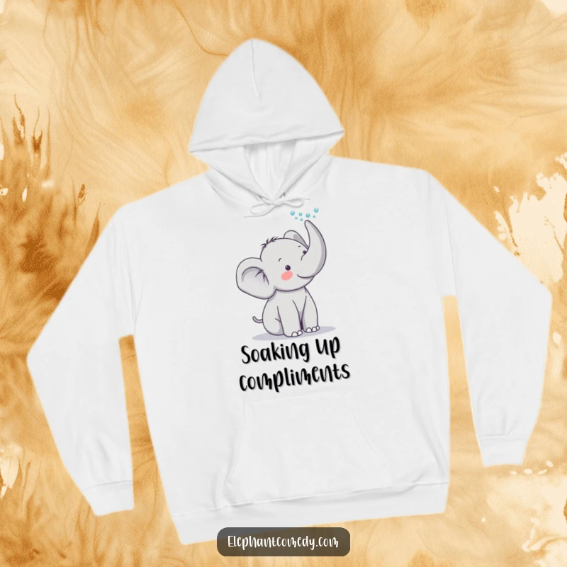 Funny elephant hoodie showing a grey elephant character in a playful mood, spraying water from its trunk with a happy expression.